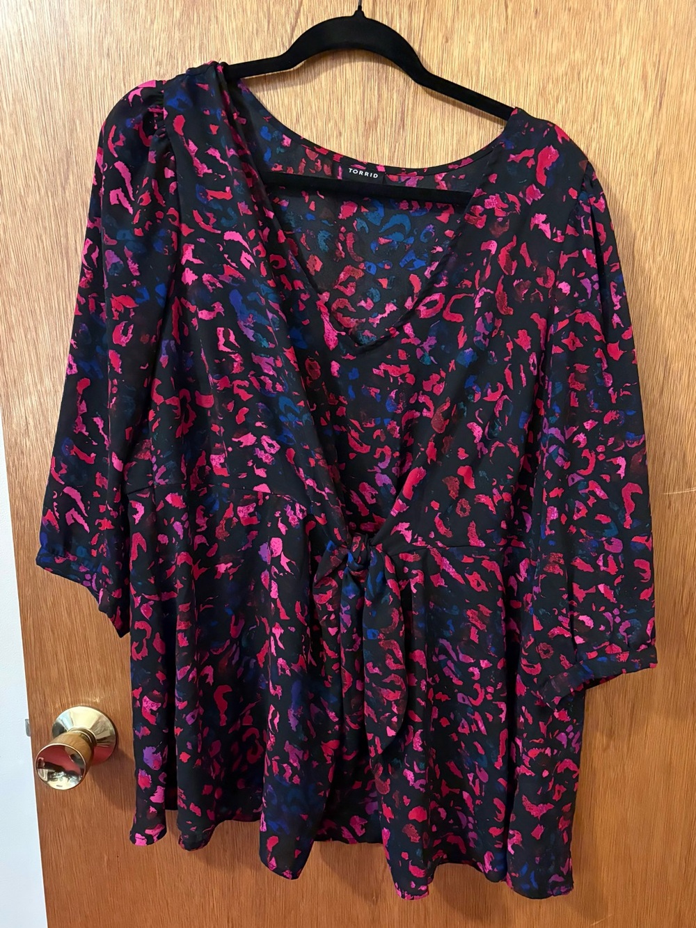 torrid Black Peplum Top with Pink, Blue, & Purple Abstract Print and Front Tie